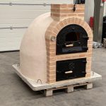 Four avec réchaud finition brique.