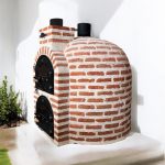 Four à bois à chaleur enveloppante finition brique.